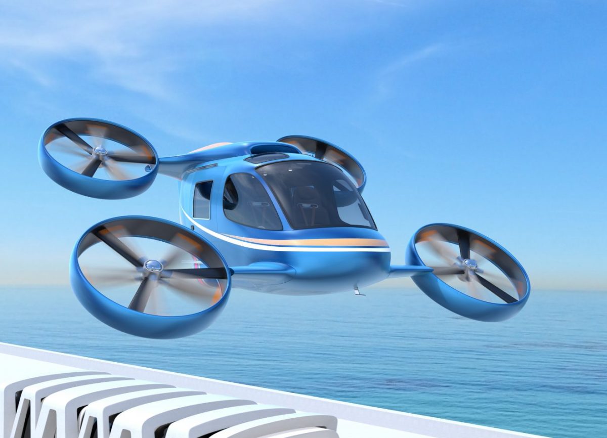 Metallic blue Passenger Drone (air taxi) flying in the sky
