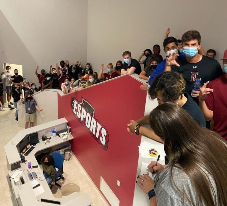Students lined up along a stairway.