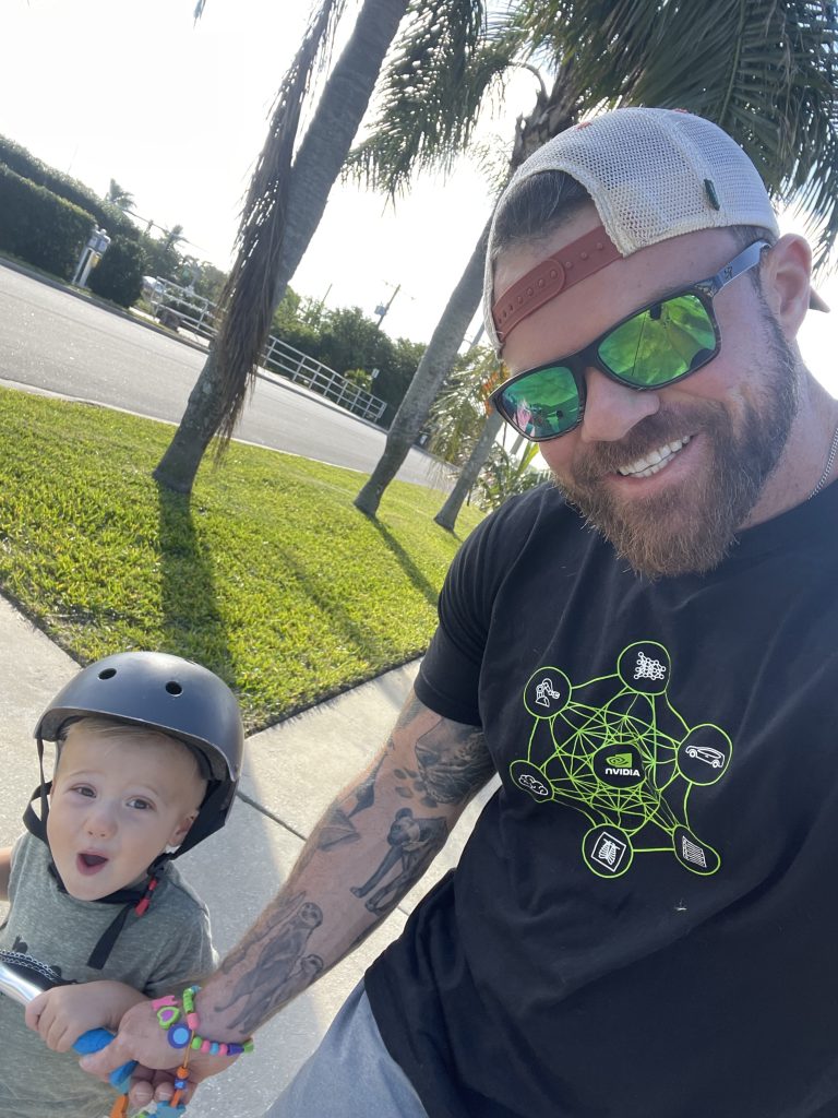 Triple Florida Tech Alumnus Kaleb Smith with his family.