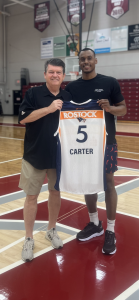 Alumnus Chris Carter with Florida Tech basketball head coach Billy Mims.