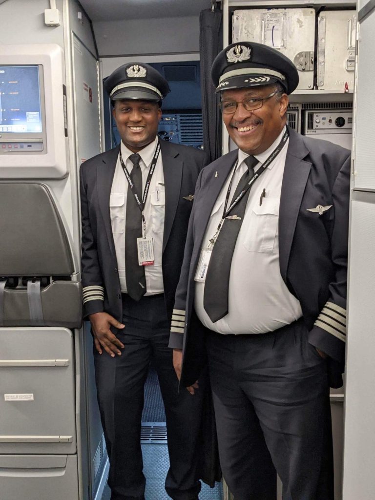 Dennis Bourne ’79 A.S., ’81, and Brandon Bourne ’13 made history as the first Black father-son duo to fly together with American Airlines.